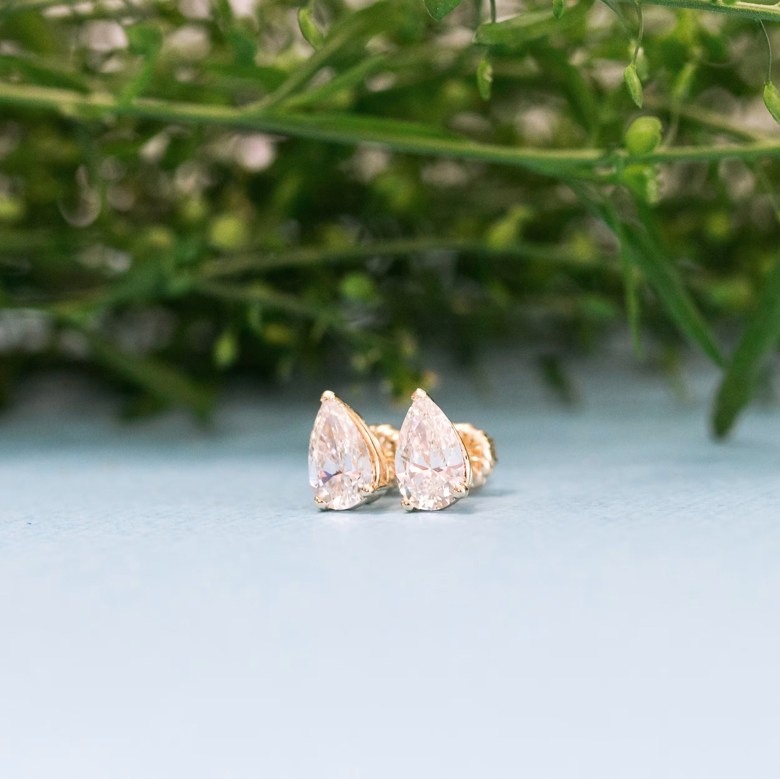 1.50 TCW Pear Shape Moissanite Stud Earrings in Gold 1